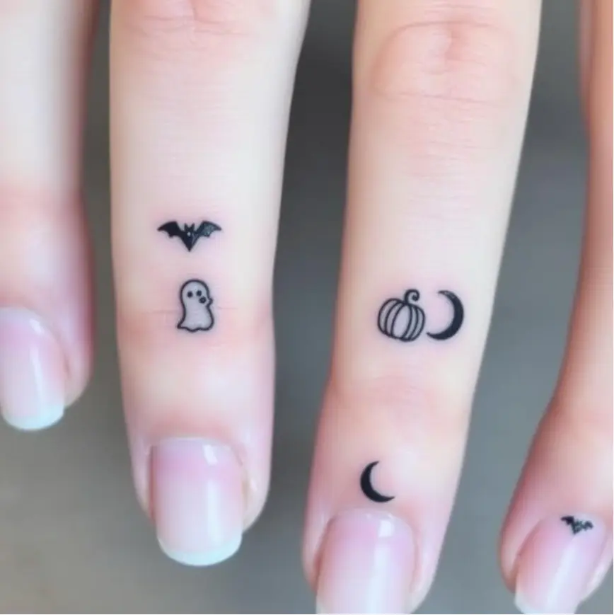 Spooky Small Halloween Finger Tattoo for Women 11